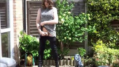 Sexy masturbating crossdresser in thigh boots outdoors on girlsporntube.one