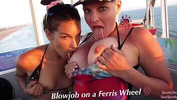 Must See! Risky Public Double Blowjob on a Ferris Wheel with Teen & MILF on girlsporntube.one