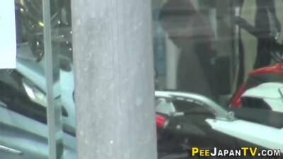 Japanese slut urinating in the rain - Japan on girlsporntube.one