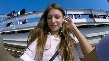 Talia Mint plays in public with remote control toy over the phone with fan on girlsporntube.one