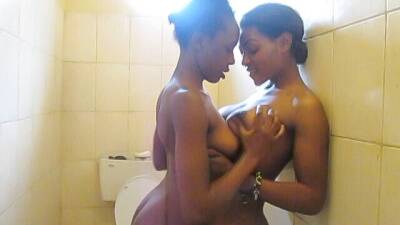 African Cuties Eating Pussy and Fingering in Shower on girlsporntube.one