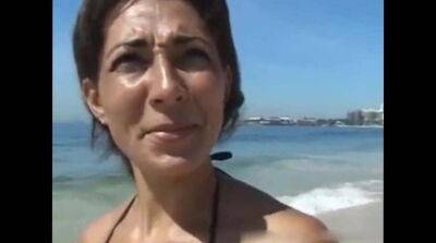 Tanned cougar was picked up on a public beach for kinky sex and a facial - Germany - Brazil on girlsporntube.one