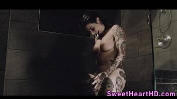 Inked les milf eaten out in the shower on girlsporntube.one