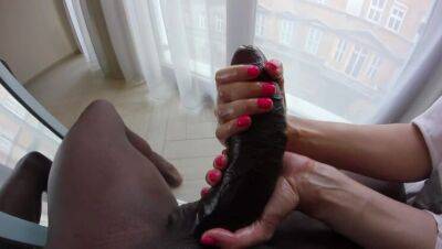 A petite blonde plays with the foreskin of a huge black cock. on girlsporntube.one