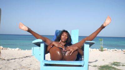 Ebony Latin Girl, Oil Skin And Public Orgasm On The Beach on girlsporntube.one