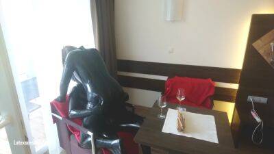 In Latex Covered Couple Enjoys A Good Drink on girlsporntube.one