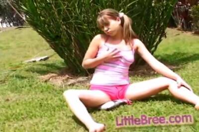 Petite Teen Strips Off Outdoors On The Grass on girlsporntube.one