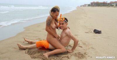 Inked hussy Lola Emme fucks horny dude on the beach on girlsporntube.one