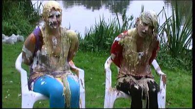 Two nasty girls enjoy BDSM and getting extremely messy outdoor on girlsporntube.one