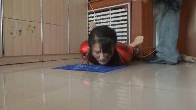 Sluty Asian girl enjoys BDSM and whipping on a floor on girlsporntube.one