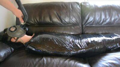 Plastic Mummification Girl With Gasmask on girlsporntube.one