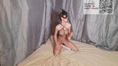 Girl In A Mask And A Mesh On The Body Sucks And Fucks A Dildo on girlsporntube.one