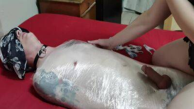 Mistress Wraps Her Slave In Clingwrap on girlsporntube.one