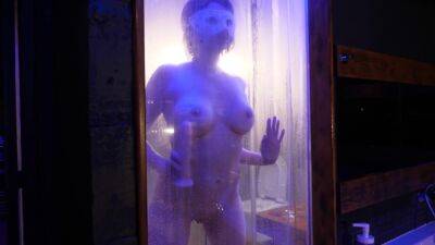 Juicy Brunette In The Shower With A Glass Wall Puts A Dildo In All Holes on girlsporntube.one