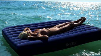 I Spied On The Beach How A Naked Girl With Big Tits Sunbathes On A Mattress.slow Motion on girlsporntube.one