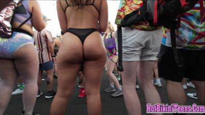 Phat ass Latina raver girl shaking her big ass cheeks at rave festival on girlsporntube.one