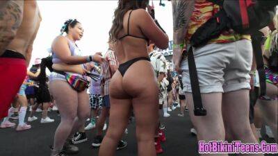 Phat ass Latina raver girl shaking her big ass cheeks at rave festival on girlsporntube.one