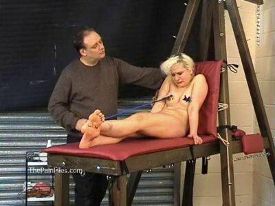 Busty blonde is punished with hot wax and hard spanking on girlsporntube.one