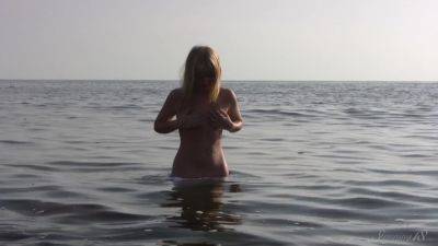 Divine Blonde Teen Blissfully Naked in the Sea on girlsporntube.one