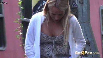 Blonde teen desperate for some golden shower in public train station - Czech Republic on girlsporntube.one