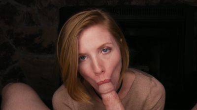 Freckled redhead throats the big dick and lets it explode on her face on girlsporntube.one