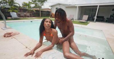 Aroused ebony goes very loud during outdoor pool porno with her new BF on girlsporntube.one