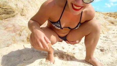 Drinking pee on the public beach in front of people, HIGH RISK - PissVids on girlsporntube.one