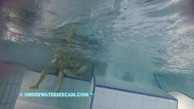 Sporty Couple Regenerating On An Underwater Bench on girlsporntube.one