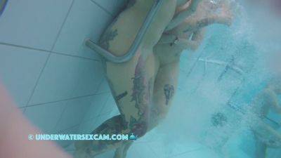 In This Underwater Video We See A Lot Of Piercings And Tattoos on girlsporntube.one