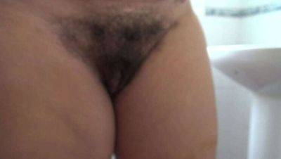 Step-Mom Susan Flashes Her Hairy Snatch to Eager Step-Son on girlsporntube.one