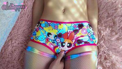 Petite 18-year-old girlfriend, Lolliepopxxxx, excitedly shows off her favorite cartoon character panties on girlsporntube.one