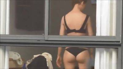 Spying on neighbour undressing. on girlsporntube.one