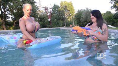 Floating Gazongas: Two British Bombshells With Big Tits In The Pool - Britain on girlsporntube.one